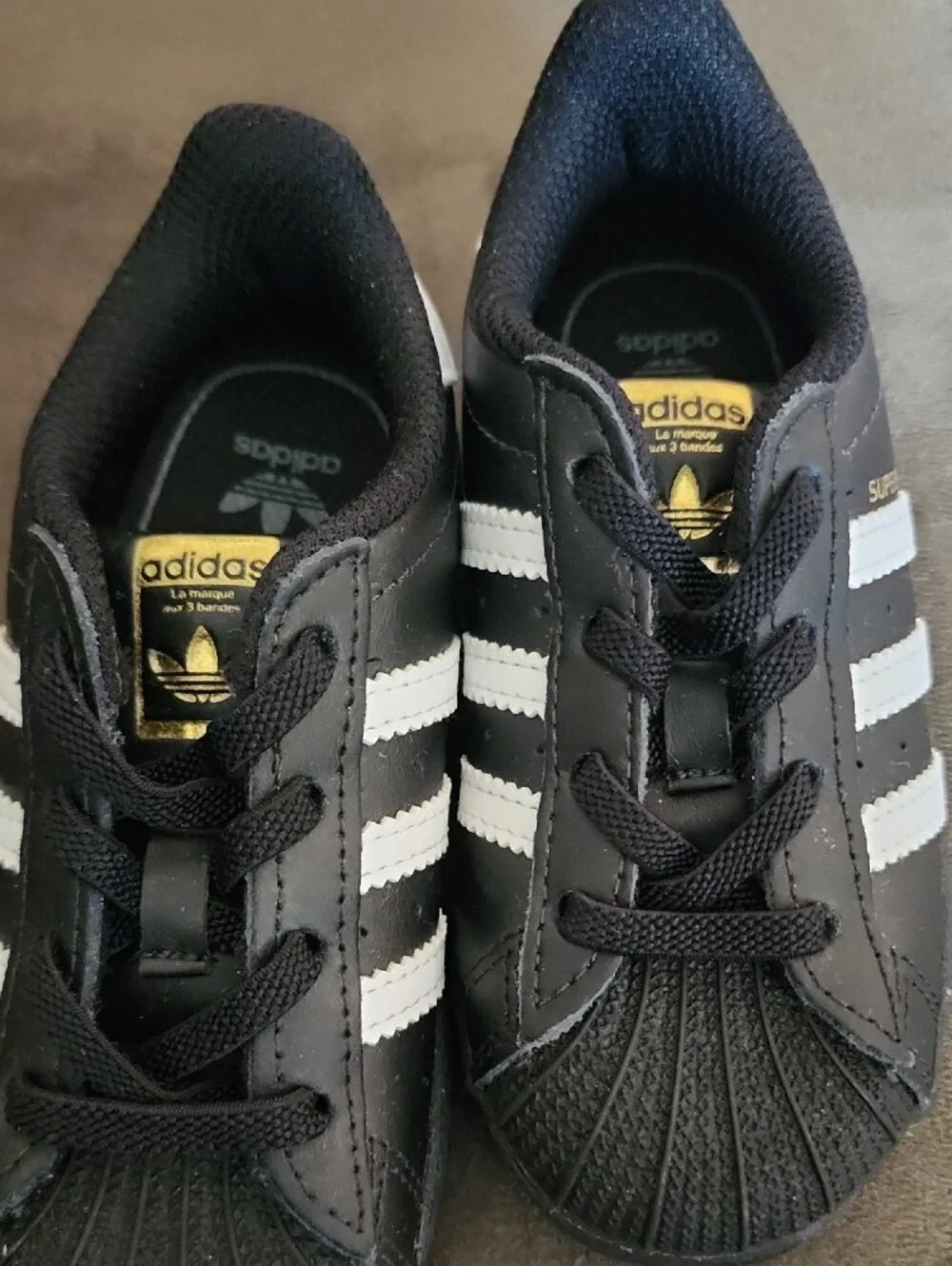 adidas Kids Black with White Stripes Superstar Sneakers